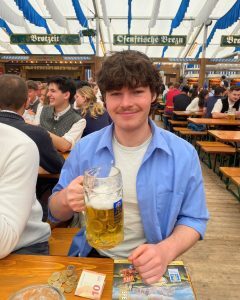Marketing and Management student Jude at a German beer hall during his study abroad year at Cologne University